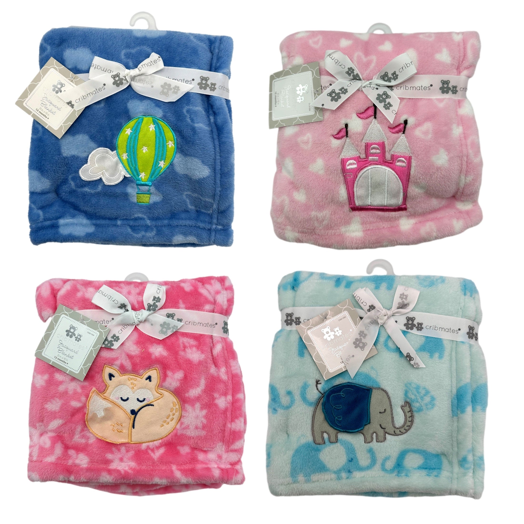 Four baby blankets are displayed against a white background. The blankets are folded and feature different colors and embroidered designs. From top left to bottom right: a blue blanket with a hot air balloon, a pink blanket with a castle, a pink blanket with a sleeping fox, and a light blue blanket with elephants. Each blanket is wrapped with a white ribbon that reads "cribmates," and a tag hangs from the ribbon.